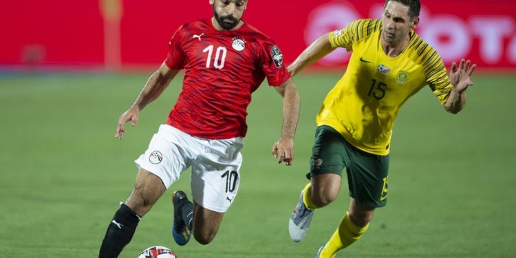 Mohamed Salah of Egypt and Dean Furman of South Africa during the 2019 Africa Cup of Nations tournament