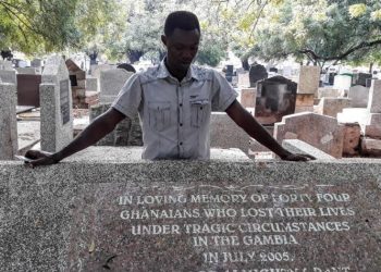 Massacre survivor Martin Kyere at Accra cemetery where six bodies were returned from Gambia.  © 2018 Bénédict De Moerloose/TRIAL International