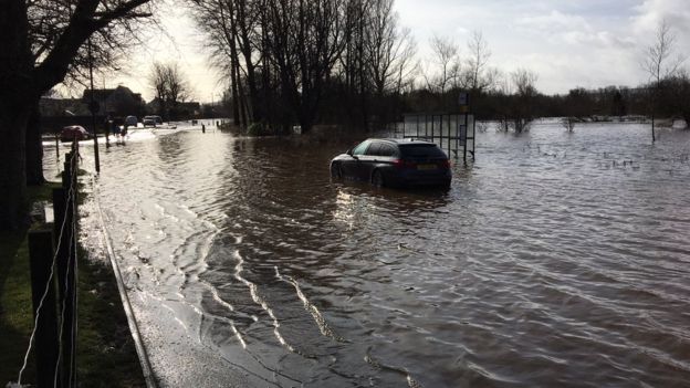 Flooding across Scotland leaves cars submerged
