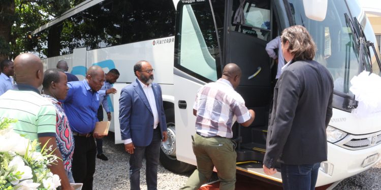 SMT Ghana Executives usher guests into the new Bus