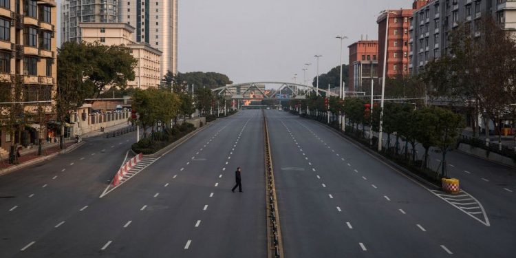 WUHAN, CHINA - FEBRUARY 03:  (CHINA OUT) A man cross an empty highway road on February 3, 2020 in Wuhan, Hubei province, China. The number of those who have died from the Wuhan coronavirus, known as 2019-nCoV, in China climbed to 361 and cases have been reported in other countries including the United States, Canada, Australia, Japan, South Korea, India, the United Kingdom, Germany, France, and several others.  (Photo by Getty Images)