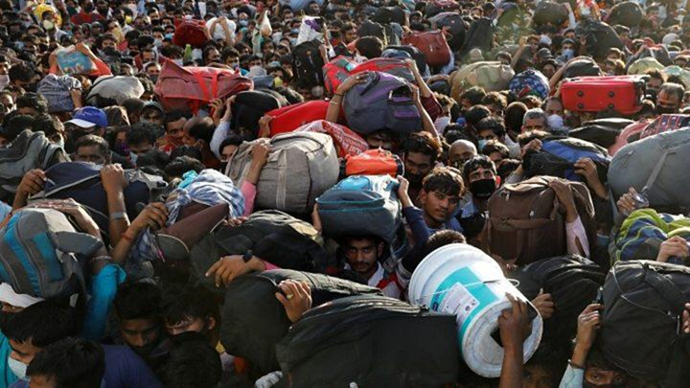 Mass migrations in India as migrant workers tried to walk from Delhi where they worked to their villages in neighboring states. (photo credit: BBC)