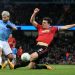 MANCHESTER, ENGLAND - JANUARY 29: Harry Maguire of Man Utd tries to block a shot from Sergio Aguero of Man City during the Carabao Cup Semi Final match between Manchester City and Manchester United at the Etihad Stadium on January 29, 2020 in Manchester, England. (Photo by Simon Stacpoole/Offside/Offside via Getty Images)