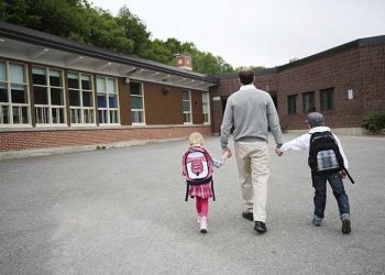 Child and Man Walking to School