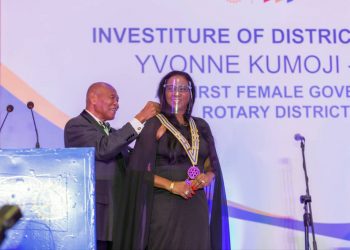 Yvonne Kumoji-Darko 
first female to hold the position of Governor in 
District 9102, being inducted into office by
Sam Okudzeto, a Past Rotary International Director and Trustee