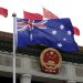FILE PHOTO: An Australian flag flutters in front of the Great Hall of the People during a ceremony in Beijing, China, April 14, 2016. REUTERS/Jason Lee