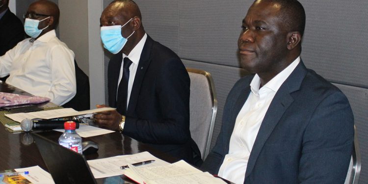 Henry Kokofu, Executive Director of the EPA flanked by President of the Ghana Chamber of Mines, Mr Eric Asubonteng (right) and Mr Terrence Watungwa, 2nd Vice President of the Ghana Chamber of Mines