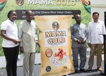 Mr. Richard Twumasi-Ankrah (second right) and Mr. Asante Krobea,(second left) Special Adviser to the Minister of Agriculture, are flanked by Mr. Amit Agrawal, Country Head of Olam Ghana and Mrs. Christina Anim-Asare after unveiling Mama Gold local rice brand.