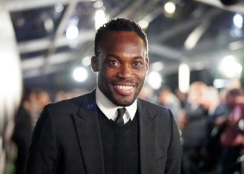 MILAN, ITALY - SEPTEMBER 23: FIFA Legend Michael Essien of Ghana  arrives on the green carpet ahead of The Best FIFA Football Awards 2019 at Teatro alla Scala on September 23, 2019 in Milan, Italy. (Photo by Simon Hofmann - FIFA/FIFA via Getty Images)