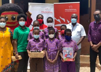 Caption: Donation of Young Ruler Magazines and sanitizers made to Ringway Basic School during Global Money Week by Prudential Life and JA Ghana