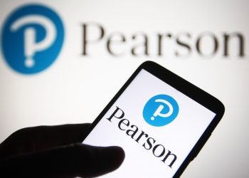 UKRAINE - 2021/07/31: In this photo illustration, Pearson plc logo of a British multinational publishing and education company seen displayed on a smartphone. (Photo Illustration by Pavlo Gonchar/SOPA Images/LightRocket via Getty Images)