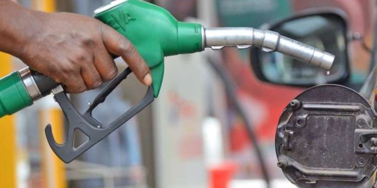 A petrol station worker fuels a car along Kimathi street on July 14 2019,after the Energy and Petroleum Regulatory Authority (EPRA) announced new retail pump prices of petroleum products effective from July 15 to August 14, 2019.price of super petrol increase by Sh0.29 per litre while diesel and kerosene decreased by Sh0.88 and SH2.31 per litre respectively.PHOTO|SILA KIPLAGAT