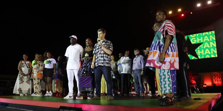 Kweku Mandela, Vice President of Global Policy, Liz Agbor-Tabi and Co-Founder, Michael Sheldrick, are joined by other members of the crew on stage during Global Citizen Festival 2022: Accra on September 24, 2022 in Accra, Ghana.