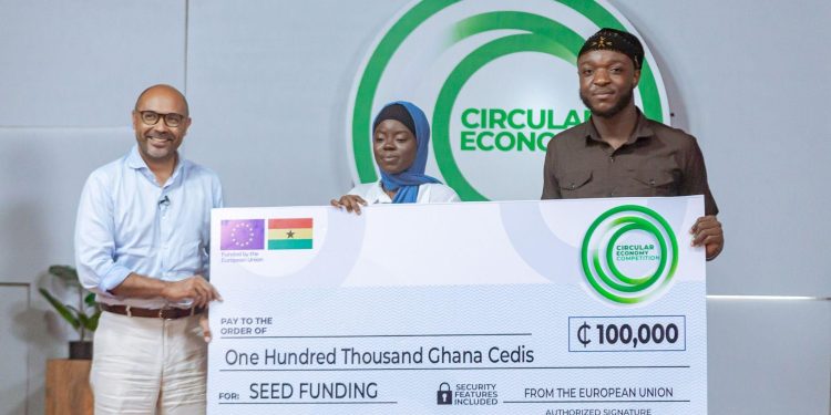 European Union Ambassador to Ghana, H.E. Irchad Razaaly presenting the prize to the CEC season 2 winners, Kodu Technology.