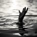 Black and white of Drowning victims Hand of drowning man needing help. Failure and rescue concept.