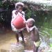 Pygmy family drinks from a swamp in Keinke, Cameroon, 2023. Picture Credit: Robert Abunaw
