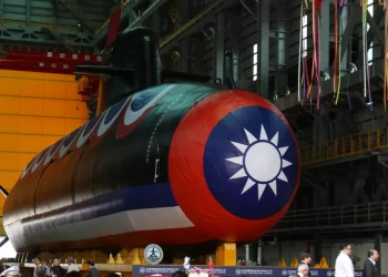 Taiwan unveils its first domestically built submarine, 'Narwhal,' at a shipyard in Kaohsiung on September 28.