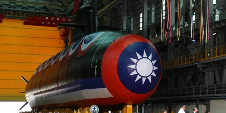Taiwan unveils its first domestically built submarine, 'Narwhal,' at a shipyard in Kaohsiung on September 28.