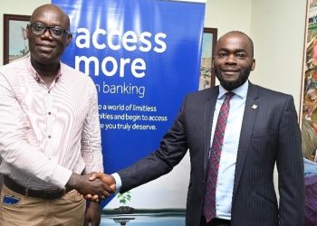 Managing Director of Access Bank Ghana, Olumide Olatunji(right) in a shot with Director of Operations at Amalitech, Matthew Darkwa