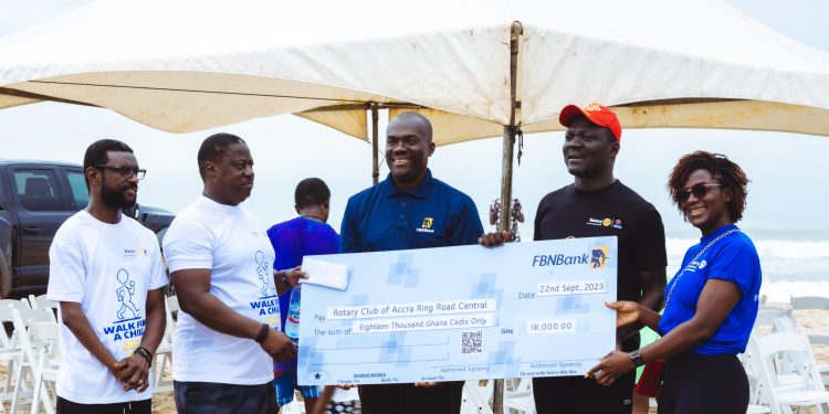 Victor Yaw Asante, FBNBank Ghana MD/CEO, second from right presenting the cheque to Kwadwo Akrofi Koram, President, Rotary Club of Accra Ring Road Central