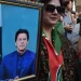 Supporters of Imran Khan's party attend a rally ahead of the general elections in Karachi