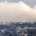 A cloud of smoke covers the skyline of Gaza