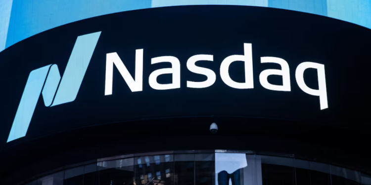 The Nasdaq logo is displayed at the Nasdaq Market site in Times Square in New York City, U.S., December 3, 2021. REUTERS/Jeenah Moon Purchase Licensing Rights