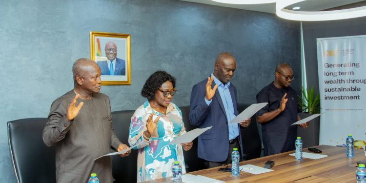 Swearing in of MIIF's Audit Committee at the head office of the fund in Accra. From left is Mr Fiam-Coblavie, an Auditor and Chartered Accountant, Madam Christiana Sakyibea Dei, Director at the Ministry of Fisheries, Mr Emmanuel Nii Noi Dowuona, a nominee from the Internal Audit Agency and Mr Hayford Amoh, Director of the Internal Audit at the Ministry of Finance. Online for the swearing-in (via Microsoft Teams) was Madam Felicia Ashley, Director of Human Capital and Administration at the Ministry of Finance