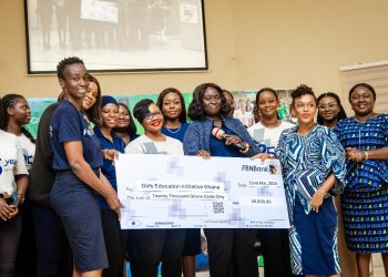 Grace Isaac-Aryee, Treasurer & Chairperson of FBNBank Women Network presenting the cheque to Elizabeth Akua Nyarko Patterson, Executive Director of GEIG