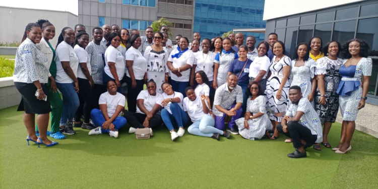 Some members of Staff of Serene Insurance and the UGMC medical team in a group photograph after the health screening exercise.