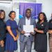 Virtual Infosec Africa Staff celebrate with a photo, after receiving the certificate from the Director General of Cyber Security Authority