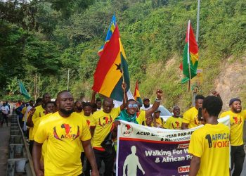 African Continental Unity Party(ACUP) members walk to galvanise grassroots support)