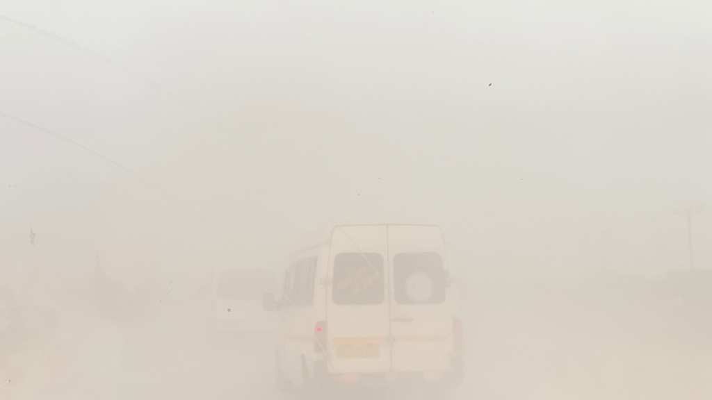 A shot of the dusty Accra-Tema Motorway stretch